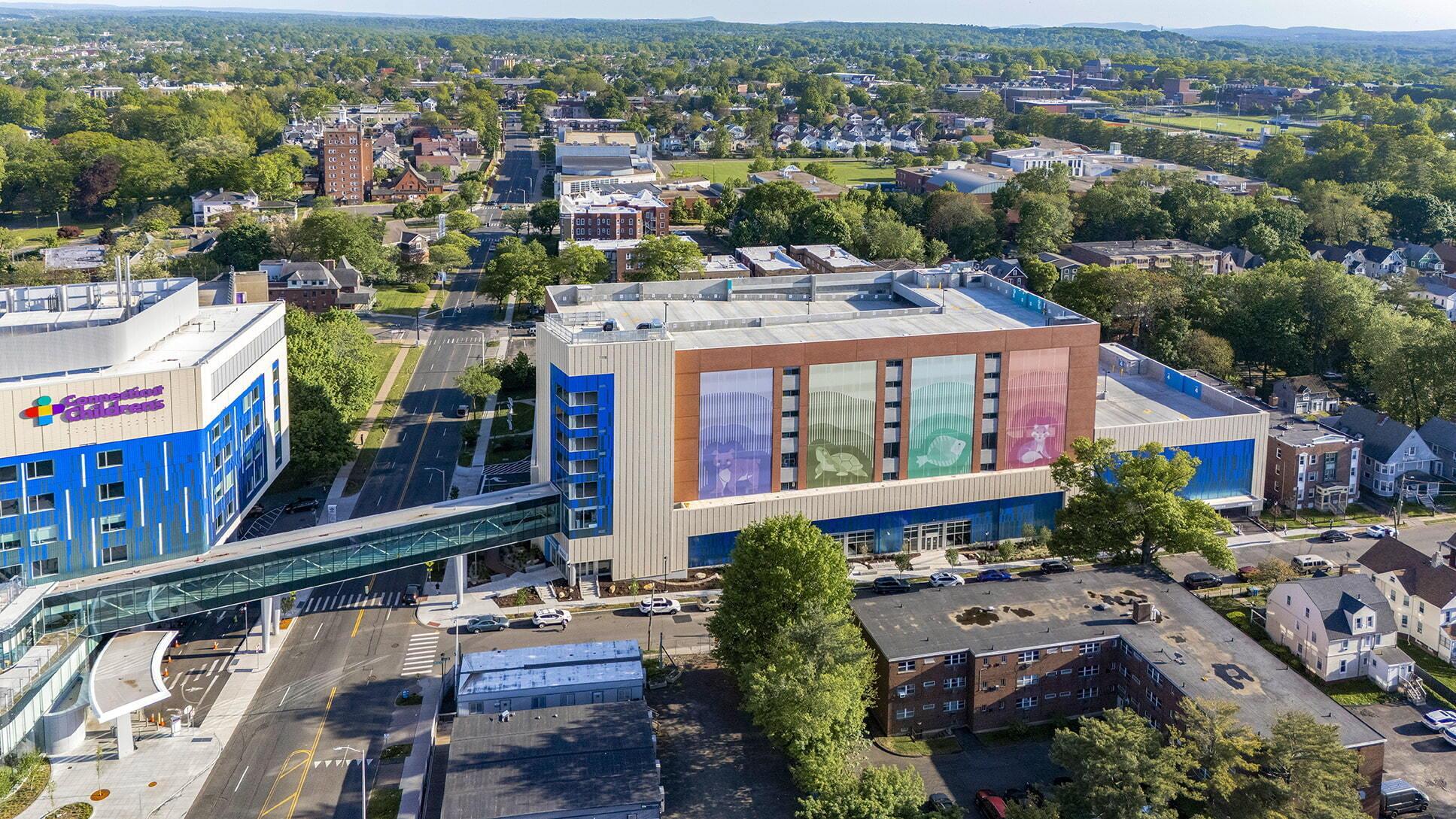 LPRI CCMC Garage Aerial view of the LPRI CCMC parking garage with its blue glass and murals amid the surrounding town